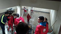 امدادرسانی هلال احمری ها به مردم تربت حیدریه در بارش شب گذشته + عکس