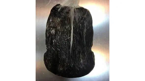  کشف تریاک از دور کمر یک مسافر +عکس 