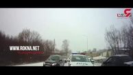 شاخ به شاخ با خودروی پلیس در جاده‌ای برفی + فیلم 