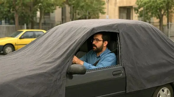 خلاقیت خنده‌دار راننده ایرانی در رانندگی با چادر تاریخ ساز شد/ بفرما تکنولوژی وطنی از شهر عجایب