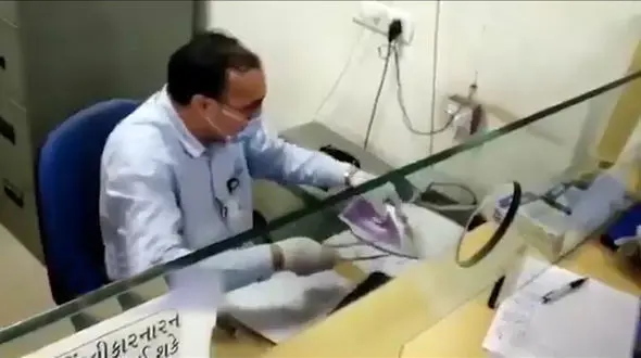 ایده خلاقانه کارمند بانک برای مبارزه با کرونا + فیلم