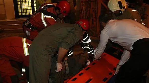 قربانی شدن 4 کارگر در حادثه سقوط جرثقیل ساختمانی در ملاصدرای تهران+ تصاویر