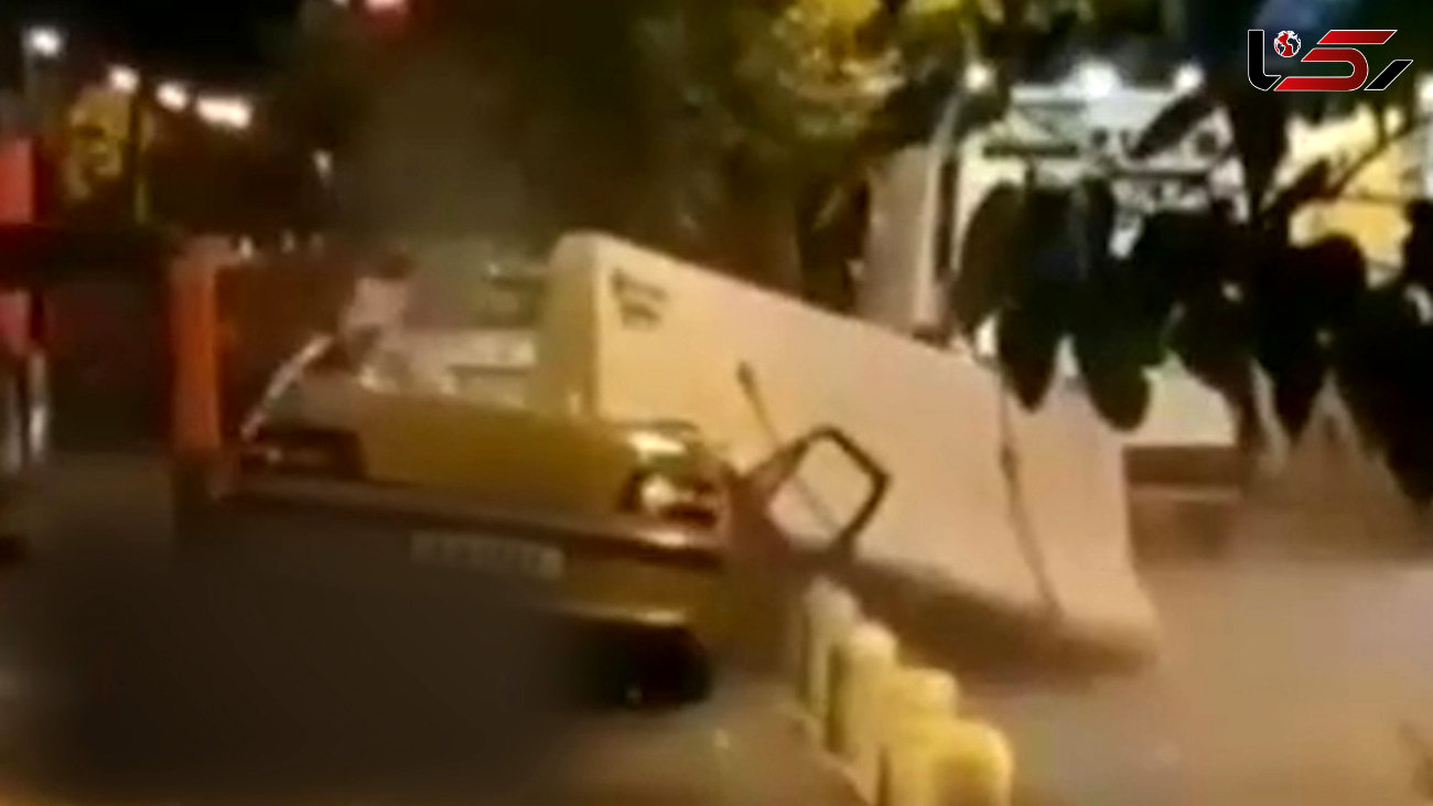 پشت پرده فیلم  له شدن ماشین مرد تهرانی زیر نیوجرسی بتونی / با دیدن این فیلم شوکه می شوید
