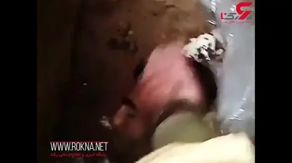 لحظه تدفین شهید مدافع حرم ، شهید بیضایی+فیلم