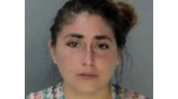 کتک خوردن زنی با بچه ای در شکم از افسر پلیس+ عکس