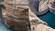 بارش باران بر سد زیبای دز، یکی از بزرگترین سدهای ایران + فیلم