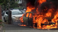 آتش سوزی بزرگ در خیابان در پی انفجار خودروی برقی + فیلم