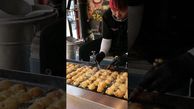 فیلم/ غذای خیابانی در کره جنوبی؛ پخت تاکویاکی هشت پا توسط یک آشپز مشهور 