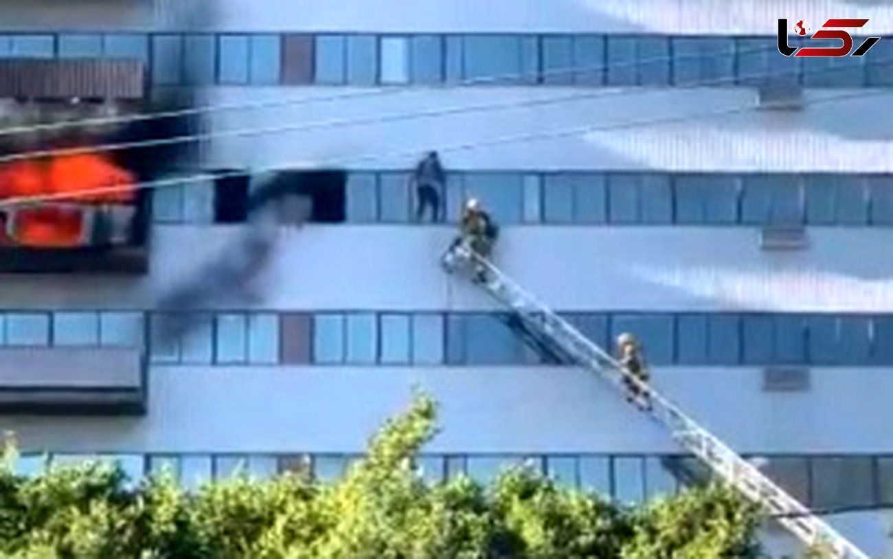لحظه دلهره آور نجات یک مرد از شعله های آتش برج + فیلم / امریکا