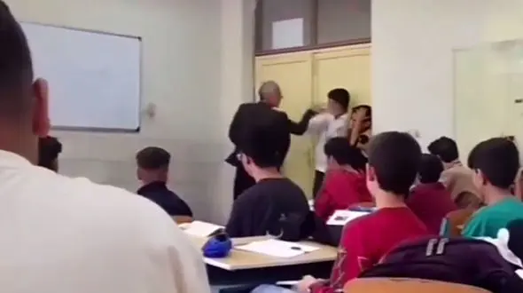 فیلم معلمی که ۳ دانش آموز را زیر چک و لگد و مشت گرفت! / واکنش آموزش و پرورش کرمانشاه !