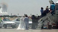 عکس / پرواز دختر و پسر جوان ایرانی با لباس عروس و داماد از فرودگاه مهرآباد تهران