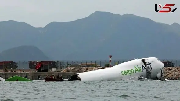 A collision between a cargo plane and a vehicle at Hong Kong International Airport has left two people dead.