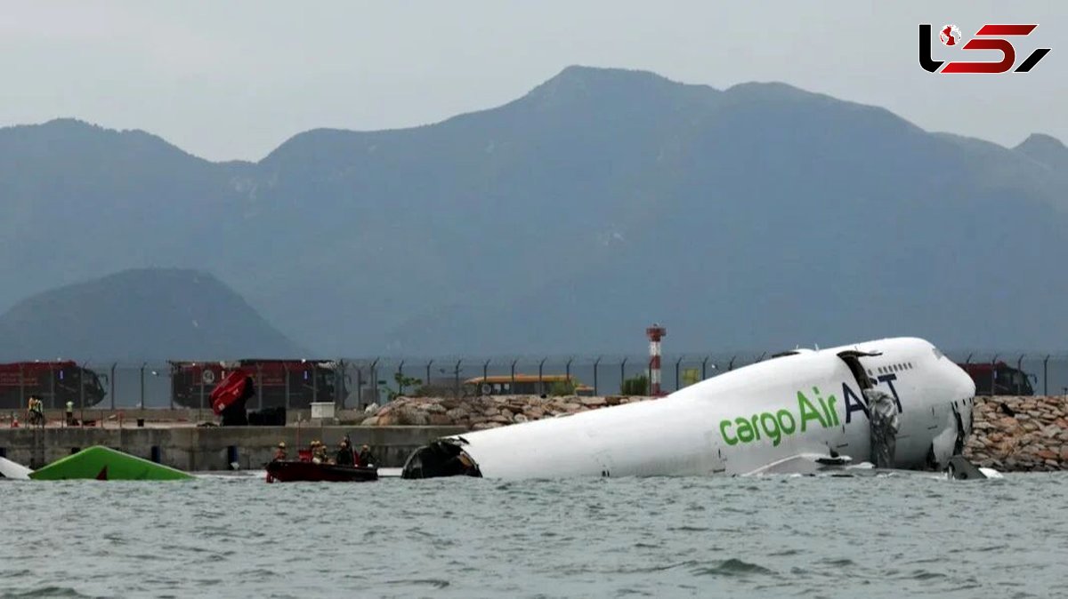A collision between a cargo plane and a vehicle at Hong Kong International Airport has left two people dead.
