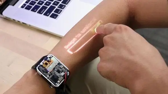 این ساعت هوشمند پوست دست را به نمایشگر لمسی تبدیل می کند