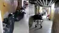 صحنه وحشتناک نگهداری 30 جسد کرونایی در یک بیمارستان روی زمین + عکس