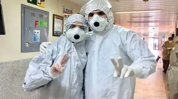 زوج پرستار بابلی راز ماندن در قرنطینه کرونایی بیمارستان را فاش کردند + عکس