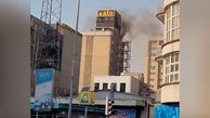 فیلم آتش سوزی یک ساختمان در نزدیکی میدان فردوسی تهران