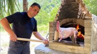 فیلم/ آشپز مشهور یک گوسفند کامل را برای کودکان روستا در تنور کباب کرد 