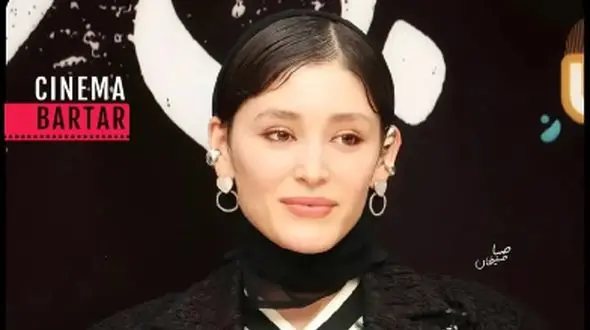 چهره نگران ​فرشته حسینی در کنار مردی ناشناس+برای مشاهده تصویر کلیک کنید