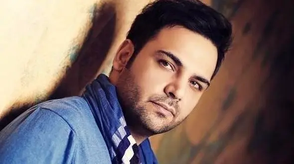 واکنش احسان علیخانی به حضور زنان در استادیوم آزادی + عکس