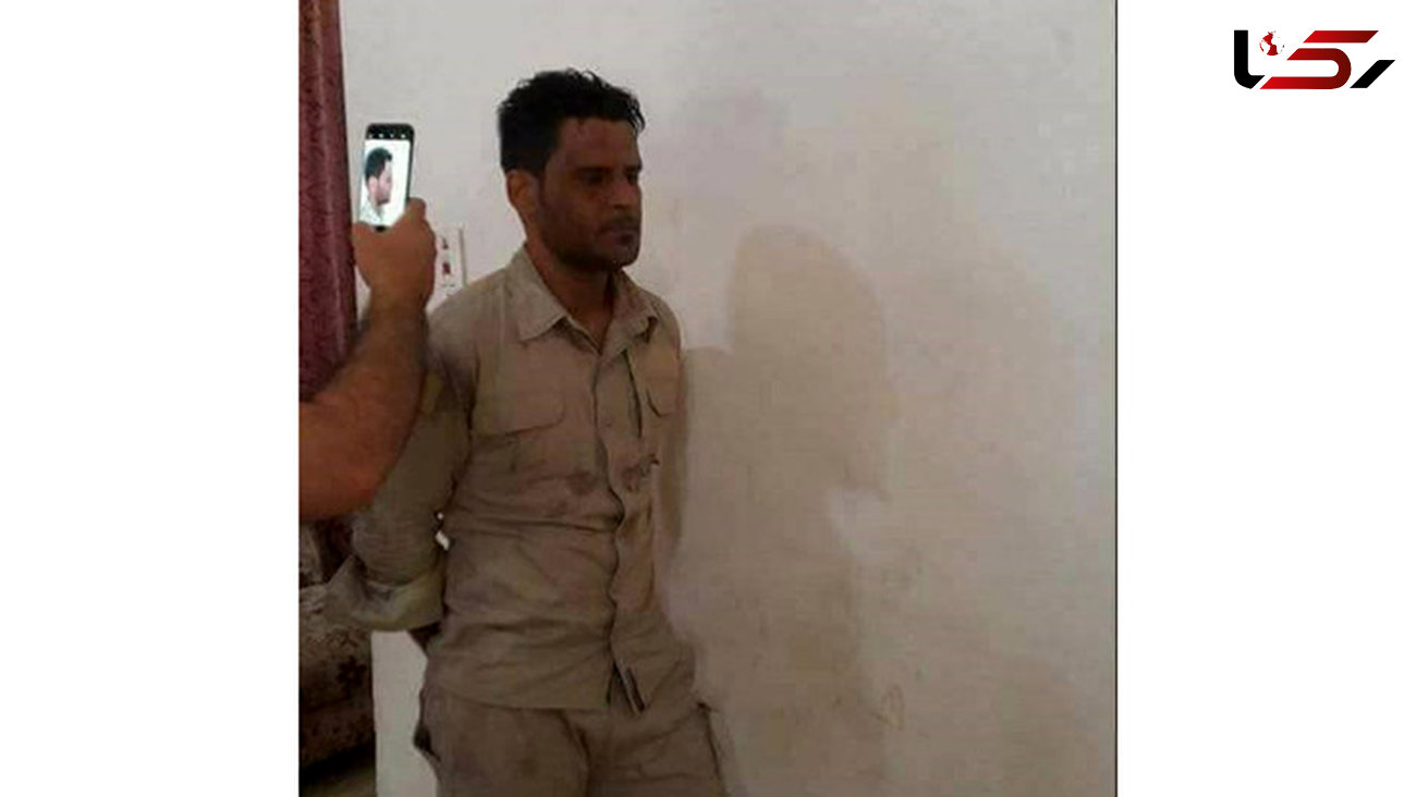 عکس/ جاسوس نفوذی داعش در میان نیروهای عراقی شناسایی شد