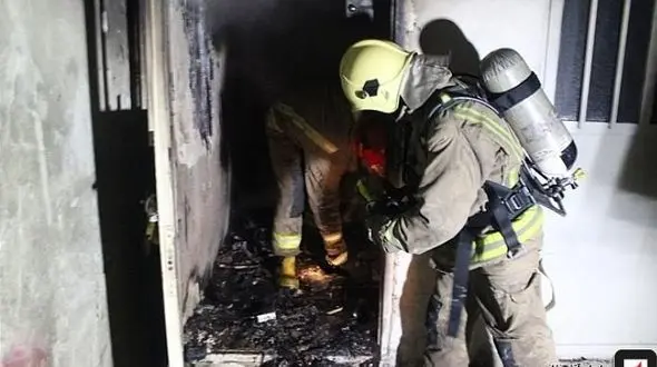 گرفتار شدن 35 نفر در میان دود و آتش در تهرانپارس + عکس 