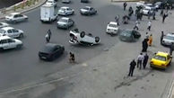 ببینید / تصادف عجیب دو خودرو در میدان ۷۲ تن قم و خوش‌شانسی عابرین