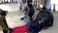فیلم / شلاق زدن یک دختر باحجاب به خاطر پوشیدن شلوار قرمز توسط طالبان
