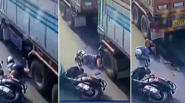 قطع شدن پای موتورسوار زیر چرخ‌های کامیون / فیلم 14+