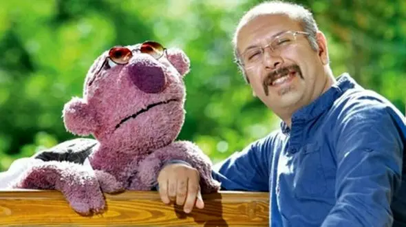 عکس همسر زیبا و خیلی جوانتر محمد بحرانی صداپیشه عروسک جناب خان + عکس های خصوصی !