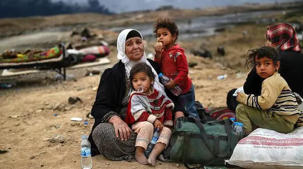 سرنوشت تکان‌دهنده خانواده داعشی ها در عراق/پسرم از من شکایت کرد تا داعشی‌ها کتکم بزنند!+تصاویر 