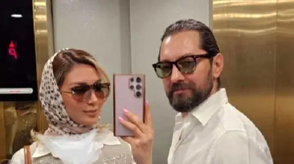 عکس / نمایی از دکوراسیون زیبای خانه پر آرامش مینا مختاری / گلدان رومیزی همسر بهرام رادان با گل های خوشرنگ