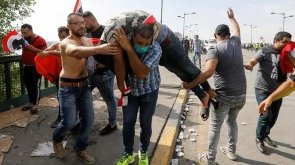 اعتراضات در عراق 30 قربانی گرفت+ تصاویر
