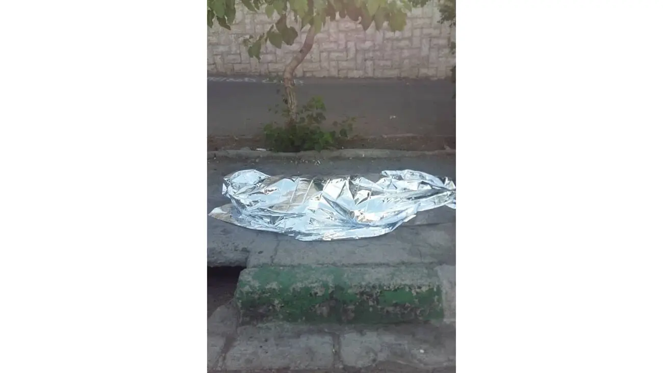 عکس جنازه مرد تهرانی که وسط خیابان کشته شد