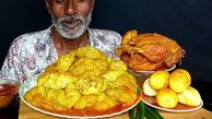 فیلم/ خوردن 4.5 کیلوگرم چلو چربی، مرغ و تخم مرغ به سبک مرد مشهور بنگلادشی 