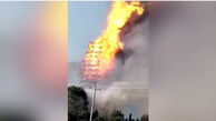 آتش‌سوزی در بلندترین برج چوبی آسیا + عکس
