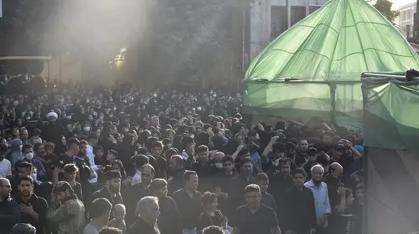 گزارش تصویری/ مراسم آئینی خیمه سوزان عصر عاشورا در کرمانشاه