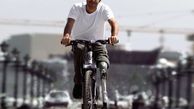 دوچرخه سواری جوان ایرانی با یک پای آهنی + عکس 