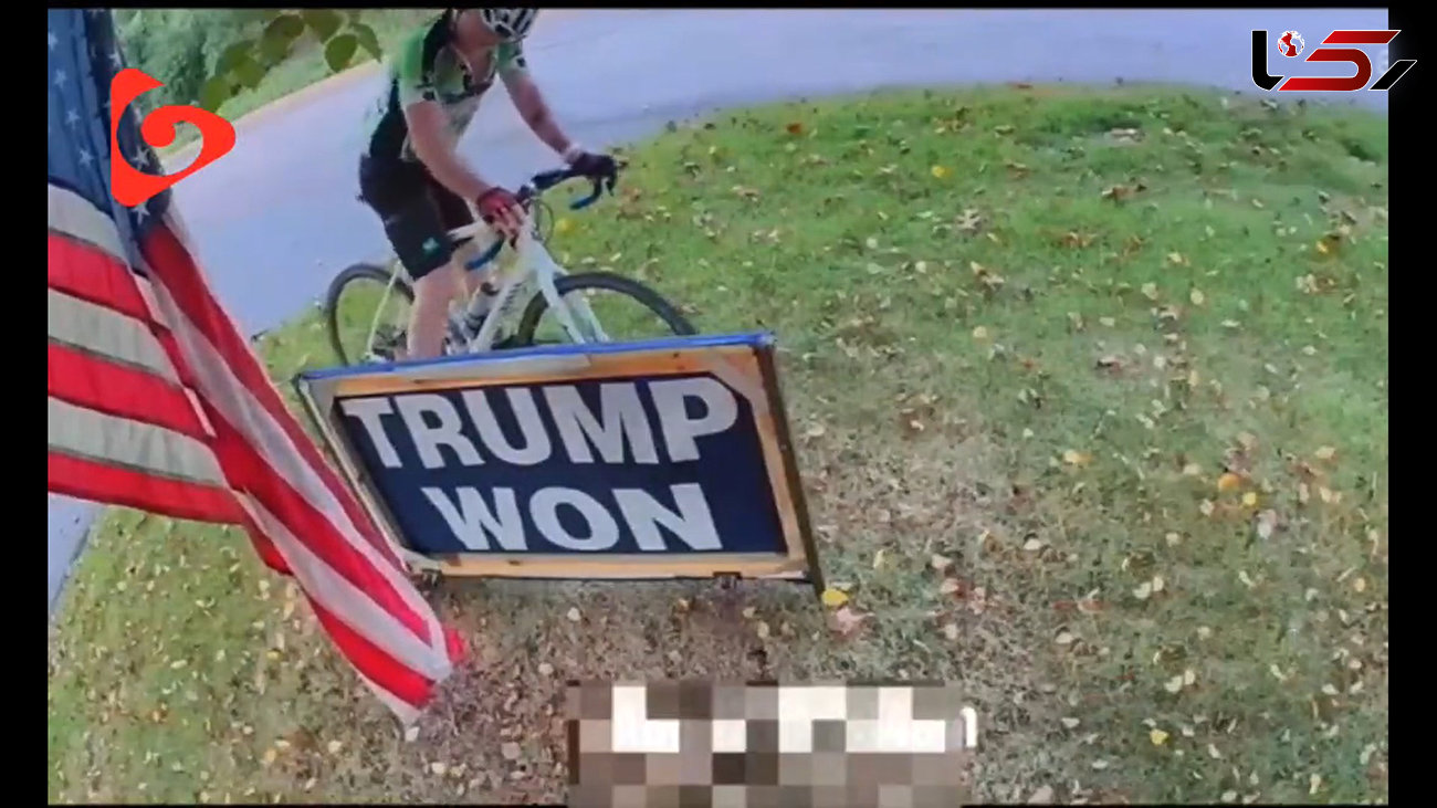 فیلم آتش زدن تابلوی حیاط خانه ترامپ توسط یک دوچرخه سوار