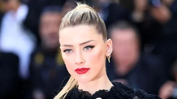 زیباترین زن جهان چرا زشت ترین شد ! / امبر هرد بعد طلاق خبیثانه دچار بلا شد !