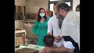 غسل تعمید شرم‌آور کشیش کلیسا جنجالی شد + فیلم