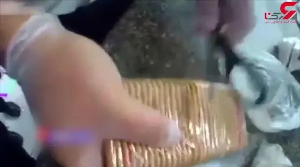 جاسازی حرفه‌ای گوشی هوشمند در بسته بندی بیسکویت زندانیان! + فیلم