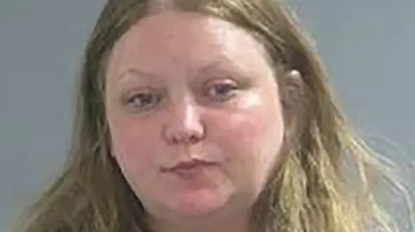 Woman charged with killing grandmother, starting house fire
