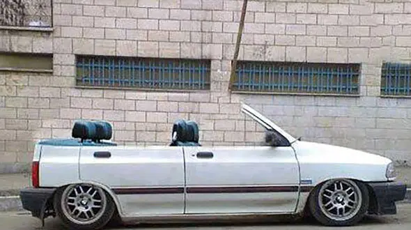 خلاقیت منحصر به فرد یک هموطن تهرانی با نوشته جالب پشت پراید حماسه آفرید/ ماشاءالله با چه سیاستی هم نصیحت میکنه+عکس