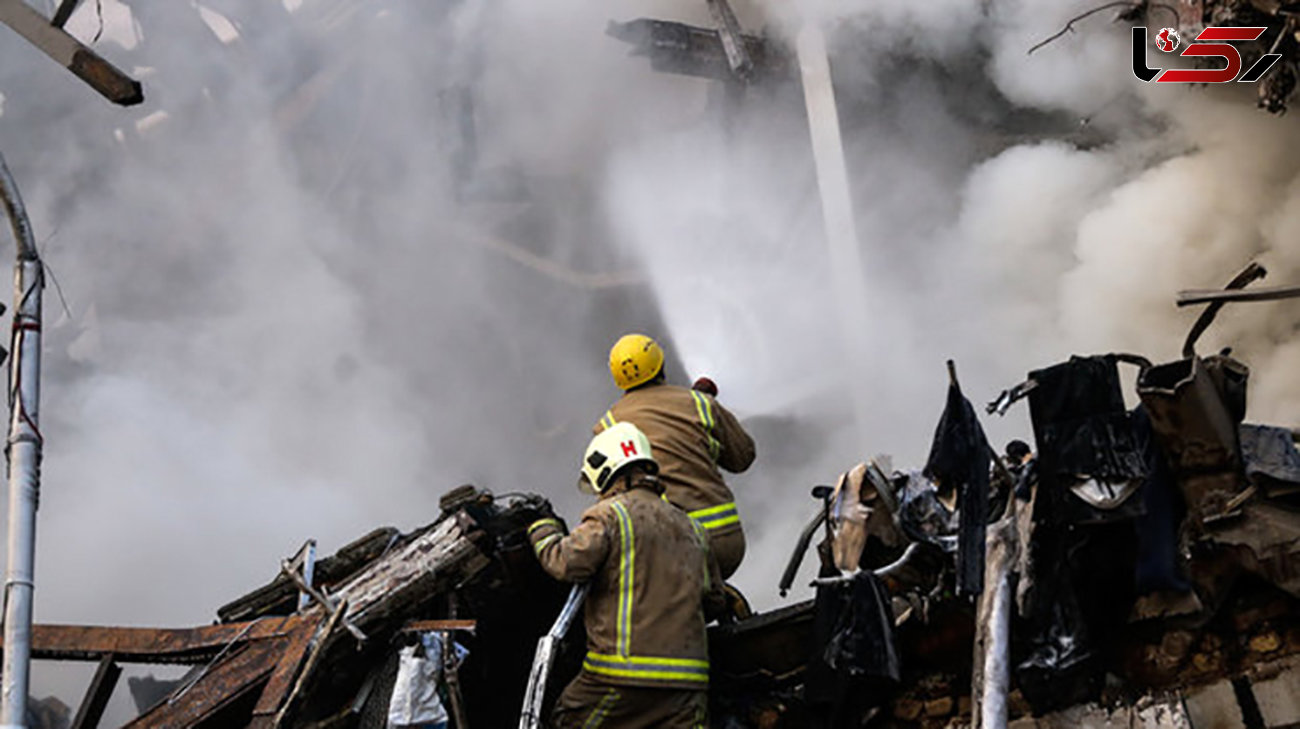 دود سفید و آتش دوباره از ساختمان فروریخته پلاسکو بلند شد