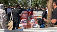 فیلم لحظه خاکسپاری پیکرهای داریوش مهرجویی و همسرش در بهشت زهرای تهران ! + عکس ها