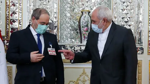 ماجرای بسته عجیب روی جیب کت وزیر سوری در دیدار با ظریف +عکس