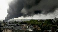 آتش‌سوزی آسمان روآن فرانسه را سیاه کرد/ شهروندان از ترس خفگی در خانه ماندند + عکس