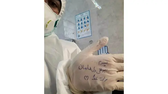 عکس تکان دهنده از دل تنگی خانم پرستار بخش کرونایی به پسرش