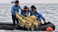 Indonesia plane crash: Jet may have 'ruptured' on impact as divers look for black boxes